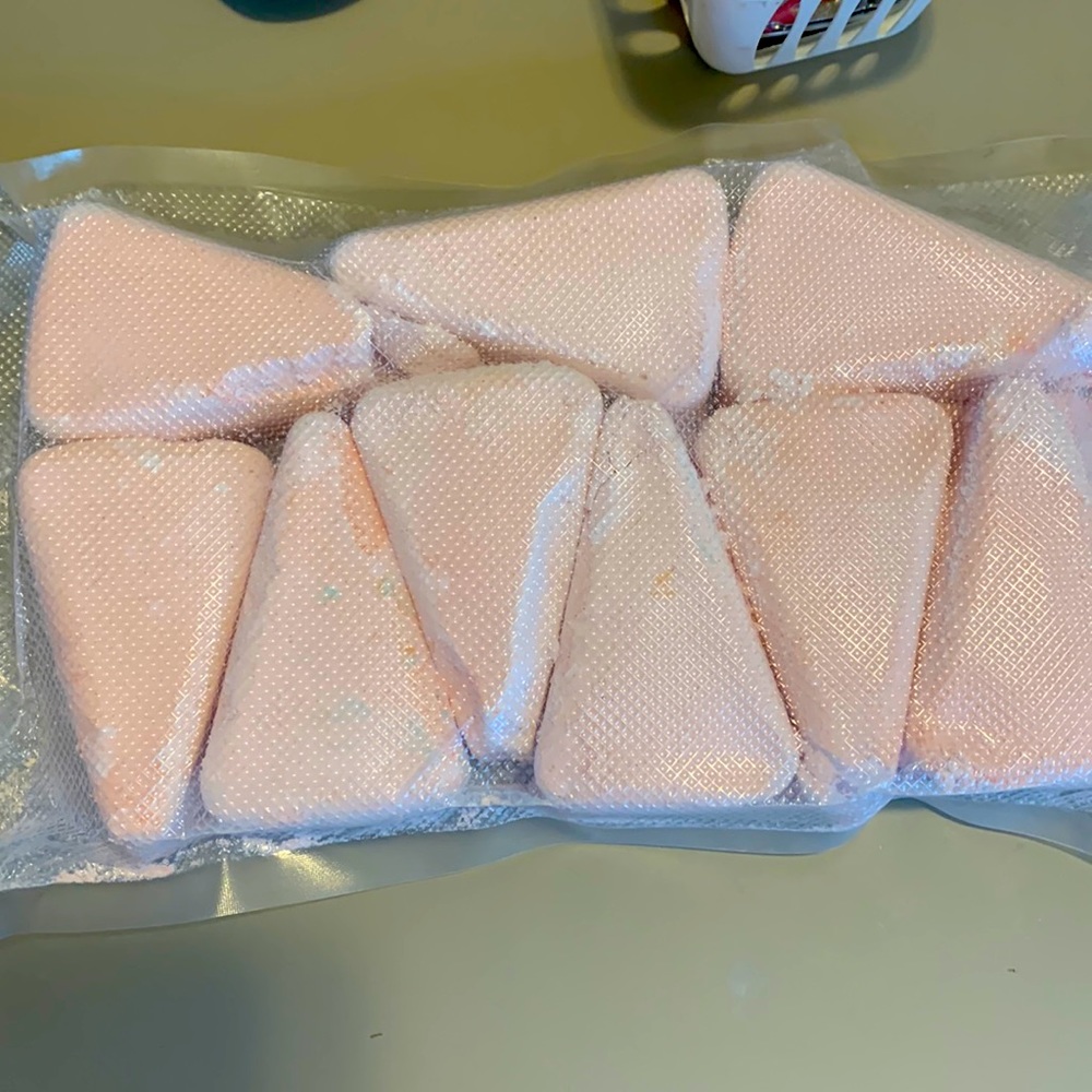 9 pink triangles